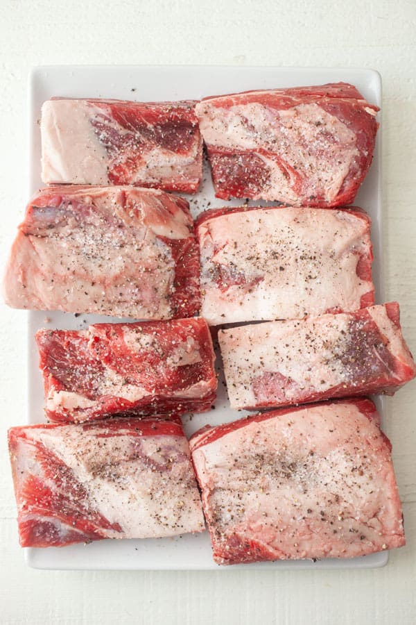 Short ribs seasoned well with salt and pepper.