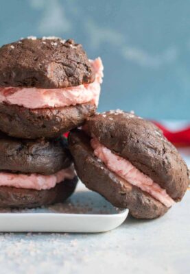 Chocolate Peppermint Whoopie Pies: These homemade whoopie pies are surprisingly easy to make. The chocolate cakes come together easily and the whole project is done in about an hour. They will be a massive hit! | macheesmo.com