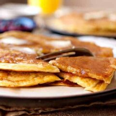 Greek Yogurt Pancakes: These are not your out-of-the-box pancakes, but they are just as easy to make! Stir together a few simple ingredients and you're minutes away from some of the most delicious and unique pancakes you'll ever make. They might look plain, but they are addictive with a perfect balance of tangy and sweet. Try them! | macheesmo.com