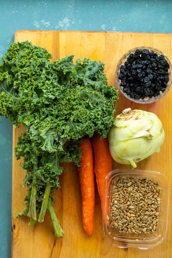 The basics for kale slaw including carrots and kohlrabi.