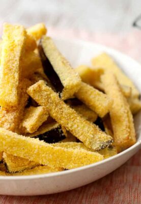 Homemade Eggplant Fries: Crispy sticks of fried eggplant are one of my favorite side dishes. Relatively easy to make and perfect with a quick mint and yogurt dipping sauce! | macheesmo.com