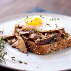 Creamed Mushrooms on Toast: One of my favorite simple breakfasts. Good hearty mushrooms, simply sauteed in olive oil with a few spices and simmered in a little cream. Piled onto sturdy toast with a few eggs! | macheesmo.com