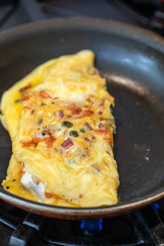 Folding omelette.