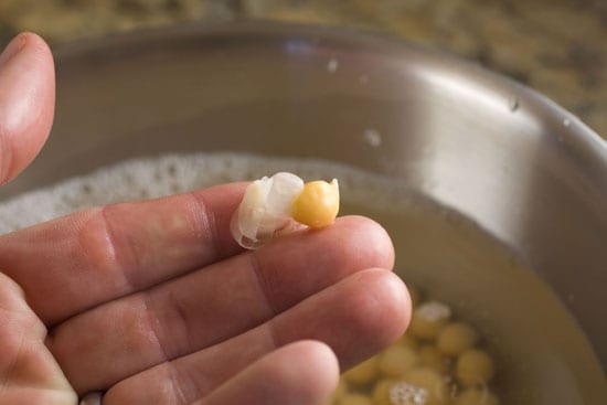 peeling chickpeas for Cashew Dip