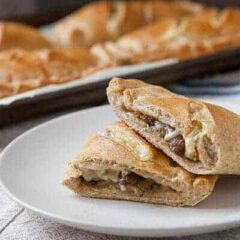 Mushroom and Swiss Hot Pockets: Homemade dough stuffed with sauteed mushrooms and swiss cheese. A hearty frozen lunch that's easy to make in bulk and reheat!