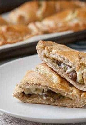 Mushroom and Swiss Hot Pockets: Homemade dough stuffed with sauteed mushrooms and swiss cheese. A hearty frozen lunch that's easy to make in bulk and reheat!