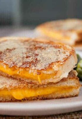 Parmesan Inside Out Grilled Cheese: This is some upper level grilled cheese sandwich business. After you cook the sandwich, coat it with shredded parmesan and cook it a second time until the crust is crispy. Crazy good.