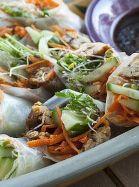 Marinated and seared tempeh sliced and stuffed in these Vegan Spring Rolls with a ton of fresh, bright vegetables. Delicious and healthy!