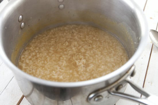 Simmering rice for congee.