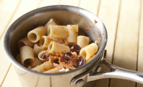 Pasta tossed with our Puttanesca Sauce