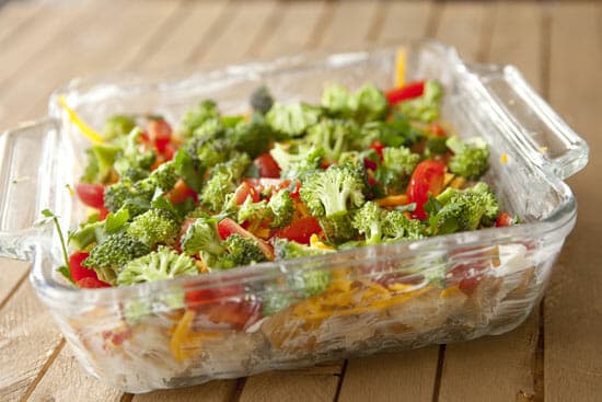 Vegetables added to casserole dish.