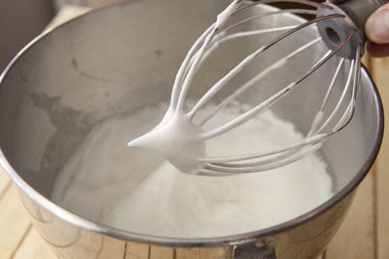 Whisking meringue for the corn souffle