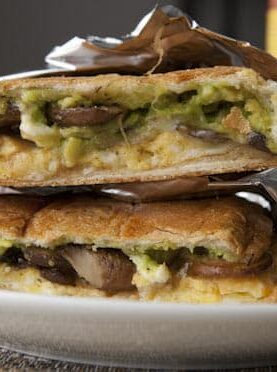 MUshroom Torta: Quite possibly the best breakfast sandwich I've ever made. Sauteed mushrooms, eggs, avocado, hot sauce, and cheese all smashed together. Gotta make this.