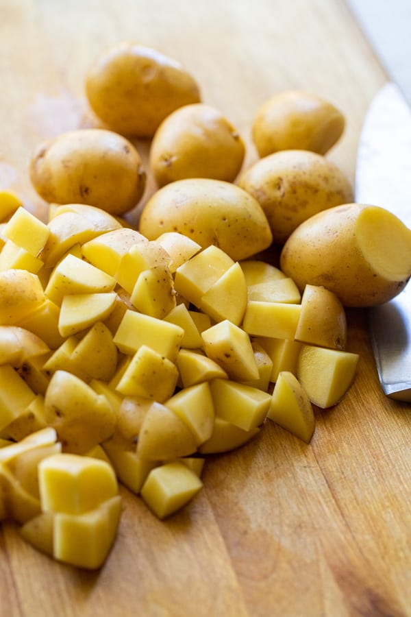 Prepping potatoes for home fries.