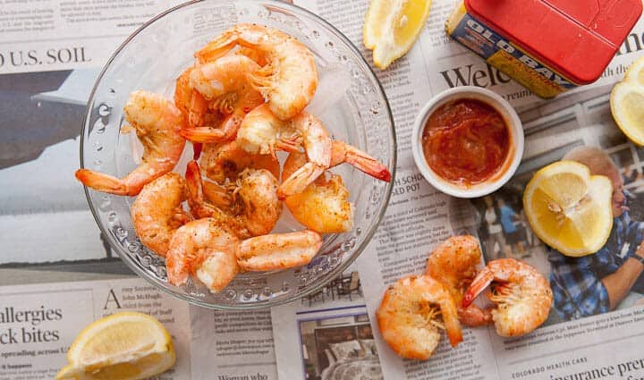 Steaming shrimp in a wire mesh.