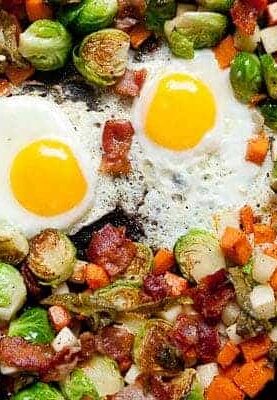 My favorite Fall Veggie Hash featuring Brussels sprouts, sweet potatoes, turnips, and bacon because, well, bacon! Dig into the awesome veggies of fall! Via Macheesmo.com