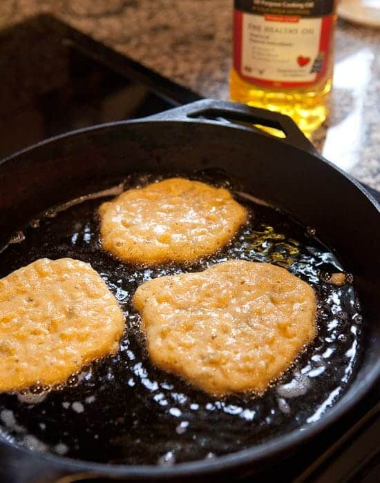 corn griddle cakes frying.