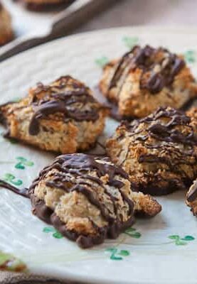 Shredded coconut and ground hazelnuts baked in to macaroons and covered in chocolate. Damn good little sweet treats!
