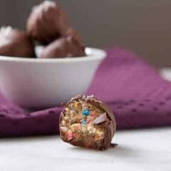 Funfetti Cookie Dough Truffles made with a safe-to-eat no bake cookie dough! These are so addictive and good. The perfect holiday sweet snack.