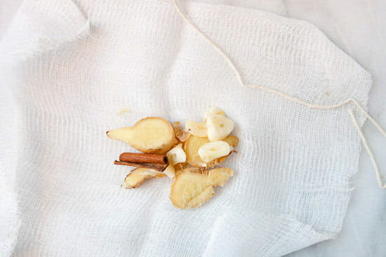 Garlic and ginger. Lots of it. Making the The Best Tea for a Cold.