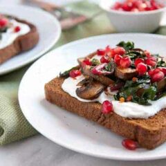 Savory Mushrooms on Toast: Sauteed mushrooms and Swiss chard served over crispy pumpernickel toast with some bonus goodies packed on!