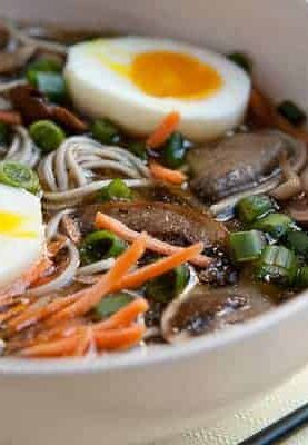 Mushroom Soba Bowls: A simmered savory mushroom broth spooned over soba noodles and topped with loads of fantastic toppings including the perfect soft-boiled egg!