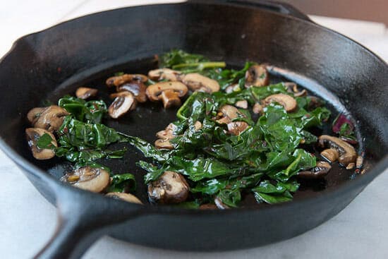 Cooking mushrooms on toast.