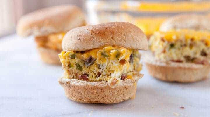 Denver Breakfast Sliders: Classic Denver omelet flavors baked together and served on toasted slider buns. This is a great way to feed a brunch crowd with fun little breakfast sliders!