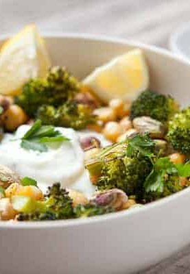 Loaded Broccoli Rice Bowls: Roasted spicy broccoli and chickpeas piled high with brown rice and a tangy lemon yogurt sauce. Hearty and healthy!
