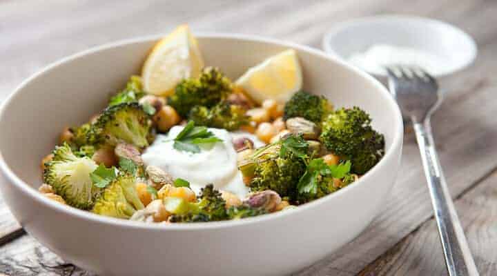 Loaded Broccoli Rice Bowls: Roasted spicy broccoli and chickpeas piled high with brown rice and a tangy lemon yogurt sauce. Hearty and healthy!