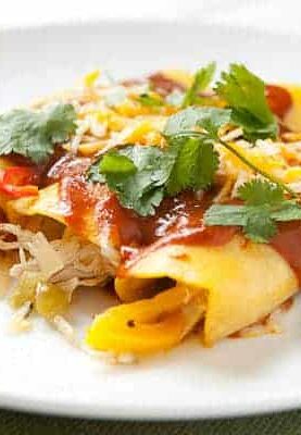 Frozen Chicken Enchiladas: Clean and delicious chicken enchiladas with my favorite homemade enchilada sauce. Plus, instructions on how to freeze these guys perfectly!