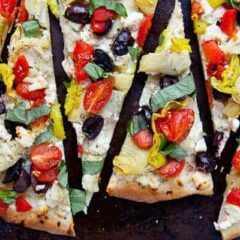Mediterranean Flatbreads: Deflated easy to make flatbreads with no yeast. The result is almost a cracker-like crispy crust topped with any toppings you like! I chose a bunch of fun Mediterranean toppings for my version.
