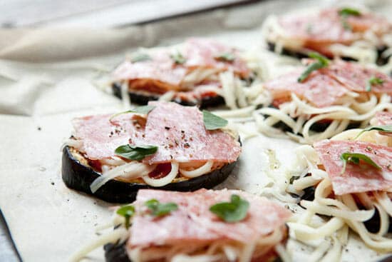 Easy eggplant pizzas topped.