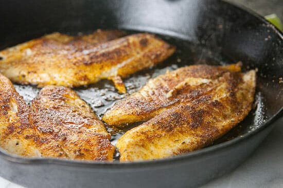 Cooked blackened tilapia for fish tacos.