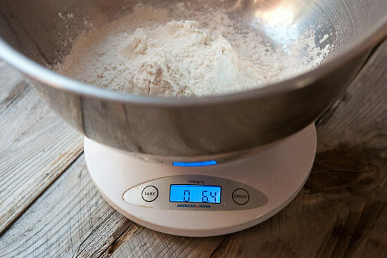 weighing flour for whole wheat beer bread