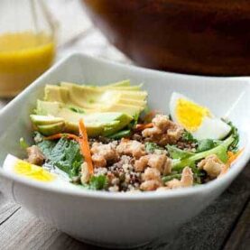 Lentil and Quinoa Chopped Salad: A delicious and hearty chopped salad loaded with lentils, quinoa, a white wine dressing, and spiced candied cashews. Great for a hearty lunch or dinner!