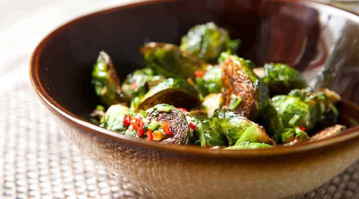 Genius Crispy Brussels Sprouts with Fish Sauce: These are the brussels sprouts of your dreams. Beautifully crispy, but tender on the inside and tossed with a salty fish sauce vinaigrette. From the Food52 Genius Recipes Cookbook! | macheesmo.com