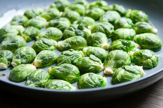 Searing crispy Brussels Sprouts.