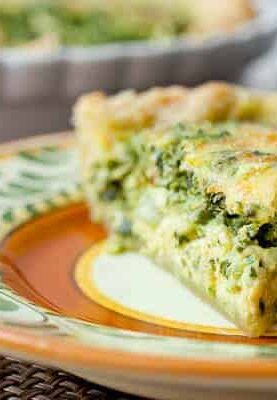 Pesto Kale Quiche: Packed with sautéed kale, pesto, and parmesan, this quiche is my new favorite brunch item. Inspired from a Whisked! DC Bakery item!