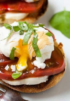 Caprese Breakfast Sandwiches: In the summer, I'm always on the hunt for quick breakfasts featuring super-ripe tomatoes. This recipe skips some of the heaviness of an eggs benedict and just focuses on ripe tomatoes and good ingredients. Keep the poached egg though!