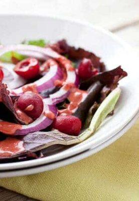 Roasted Cherry Vinaigrette: A simple homemade vinaigrette with just a few ingredients to highlight the delicious, seasonal roasted cherries. Perfect for a light summer salad!