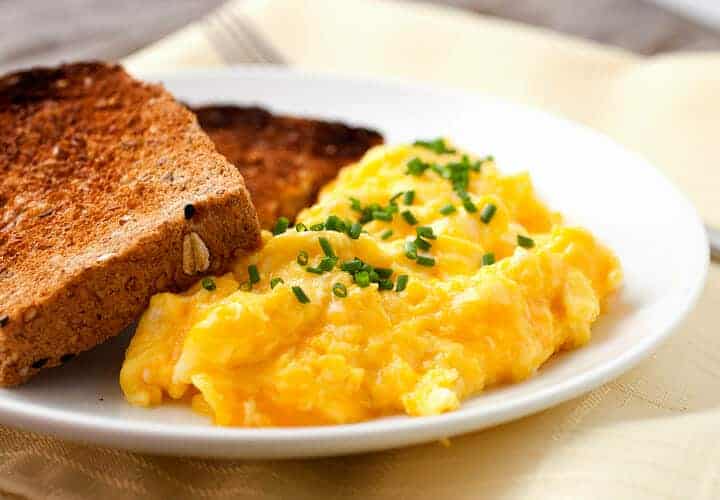 How to Make Perfect Cheesy Eggs every time! The true key to cheesy eggs is all about temperature control. Once you get it down you can use a bunch of different cheeses for different results!
