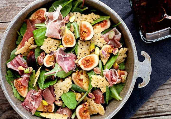 Fresh fig salad w/ Crunchy Parmesan Chips: This is one of my favorite ways to eat fresh figs which are only ripe and available in late summer. The salad is light, but with big flavors including pistachios, proscuitto, and crunchy homemade parmesan chips. It's beautiful and delicious! | macheesmo.com