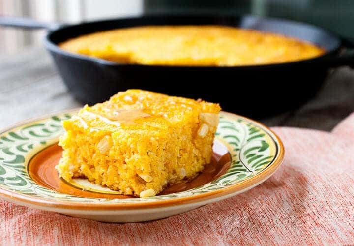 Roasted Sweet Corn Cornbread: There are a lot of ways to make cornbread, but this is my new favorite way. When corn is in-season and perfect, roasting it and blending it makes for a slightly chunky and sweet cornbread without added sugar. It's perfect with a drizzle of honey or would be a great side for any number of dishes! | macheesmo.com