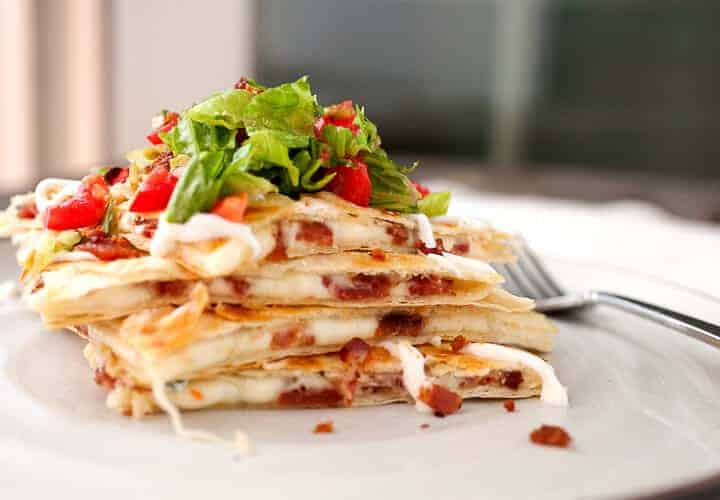 BLT Quesadillas: Simple quesadillas filled with crispy bacon and spicy pepper jack cheese and topped with a light and fresh tomato salad! | macheesmo.com