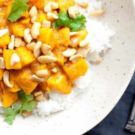 Pumpkin Curry Rice Bowls - Made from scratch with a real pumpkin! Don't get scared. It isn't that hard and is totally worth the work. Slightly spicy and sweet, this is the curry recipe you need in the fall!