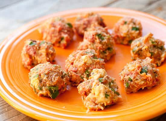 Shaped meatballs on a plate.