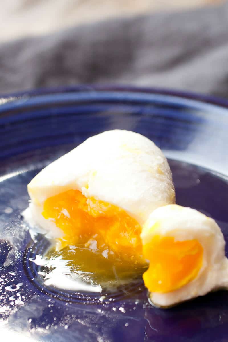 How to Poach an Egg in the Microwave! This poached egg method is great for beginners. All you need is a microwave-safe container and some eggs! The results are great if you follow these easy instructions! | macheesmo.com