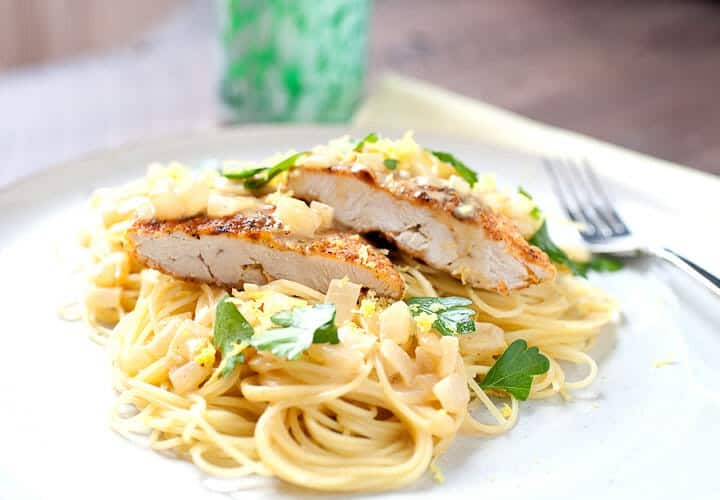 Weeknight Crispy Chicken: This super-simple, under 30 minute dish is perfect for a weeknight. Crispy chicken cutlets with lemon, a simple cream sauce, and angel hair pasta! | macheesmo.com