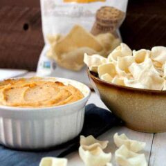 Spicy Cauliflower Dip: This healthy dip is a great substitution for a classic baked cheese dip. It has just enough sharp cheddar and is loaded with pureed cauliflower and delicious spices. I like to serve mine with Simply7 Lentil chips! #sponsored | macheesmo.com